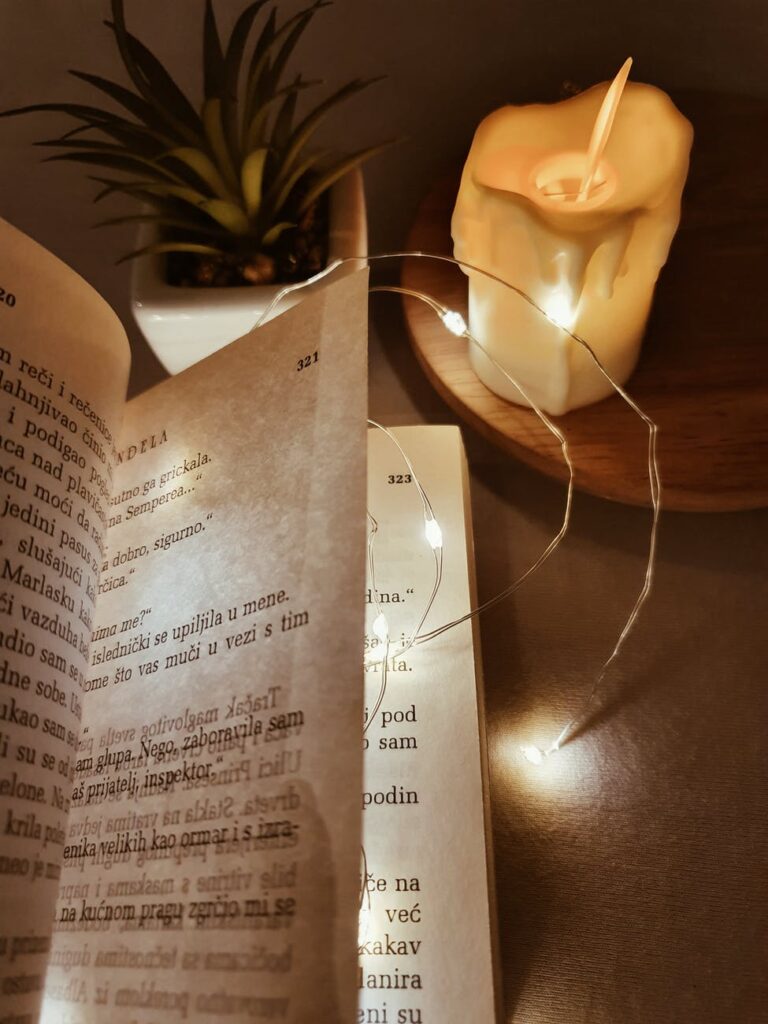 a book of poetry on a wooden table